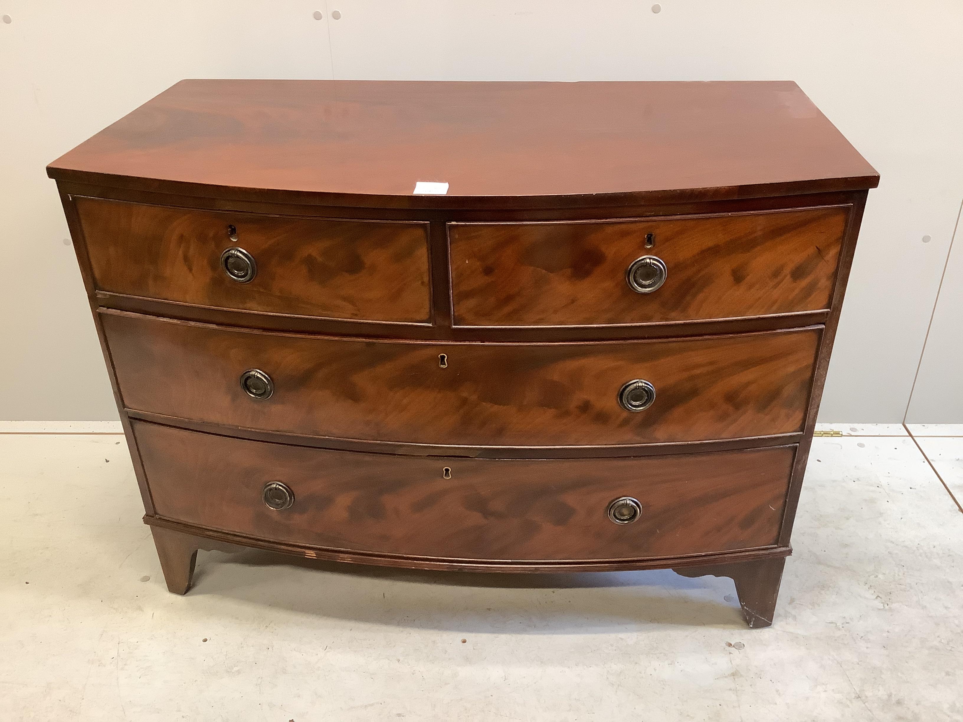 A Regency mahogany bowfront four drawer chest (cut down), width 106cm, depth 53cm, height 79cm